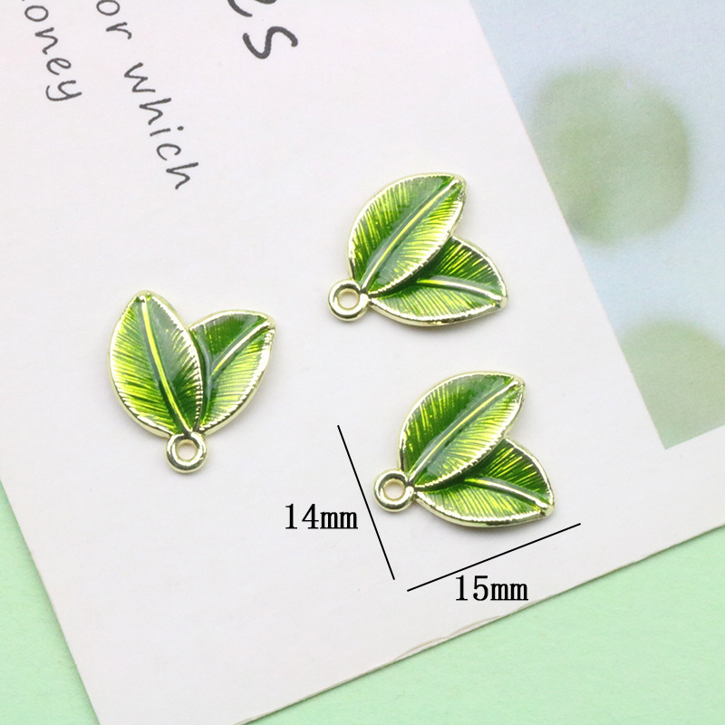 11 szt. Kolczyki z zielonymi l – Earrings recenzja i cena