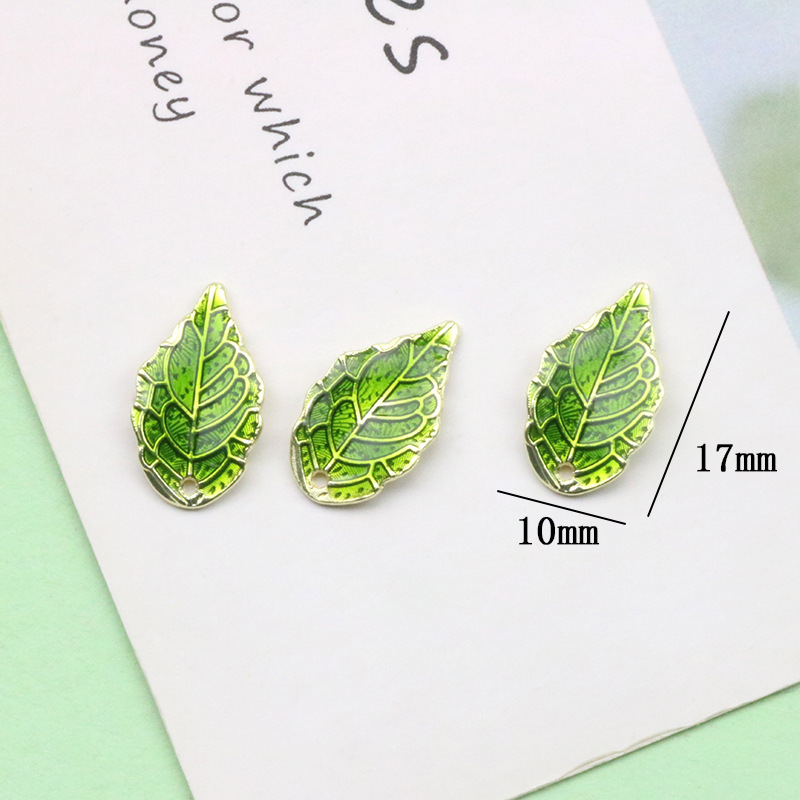 11 szt. Kolczyki z zielonymi l – Earrings recenzja i cena