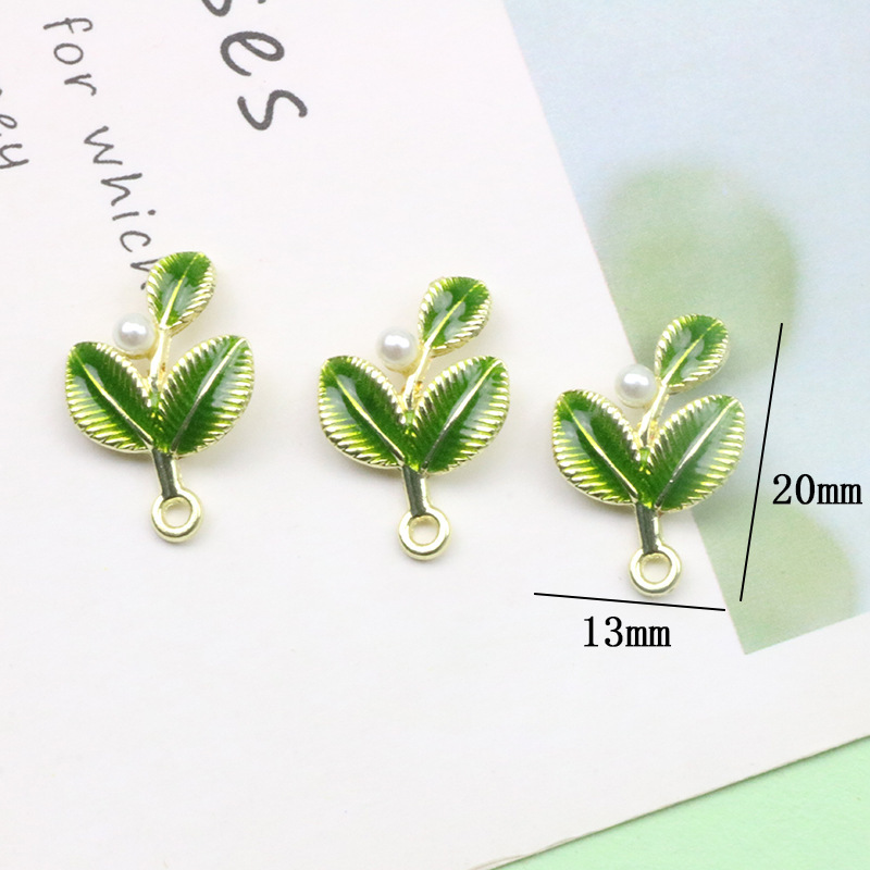 11 szt. Kolczyki z zielonymi l – Earrings recenzja i cena