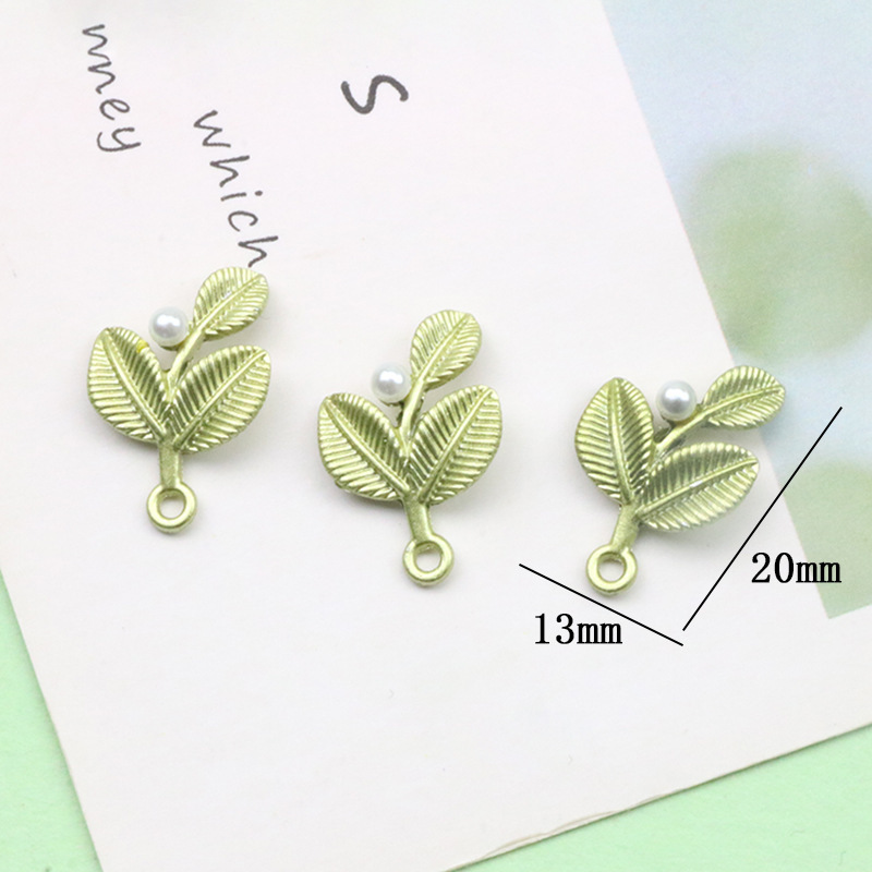 11 szt. Kolczyki z zielonymi l – Earrings recenzja i cena